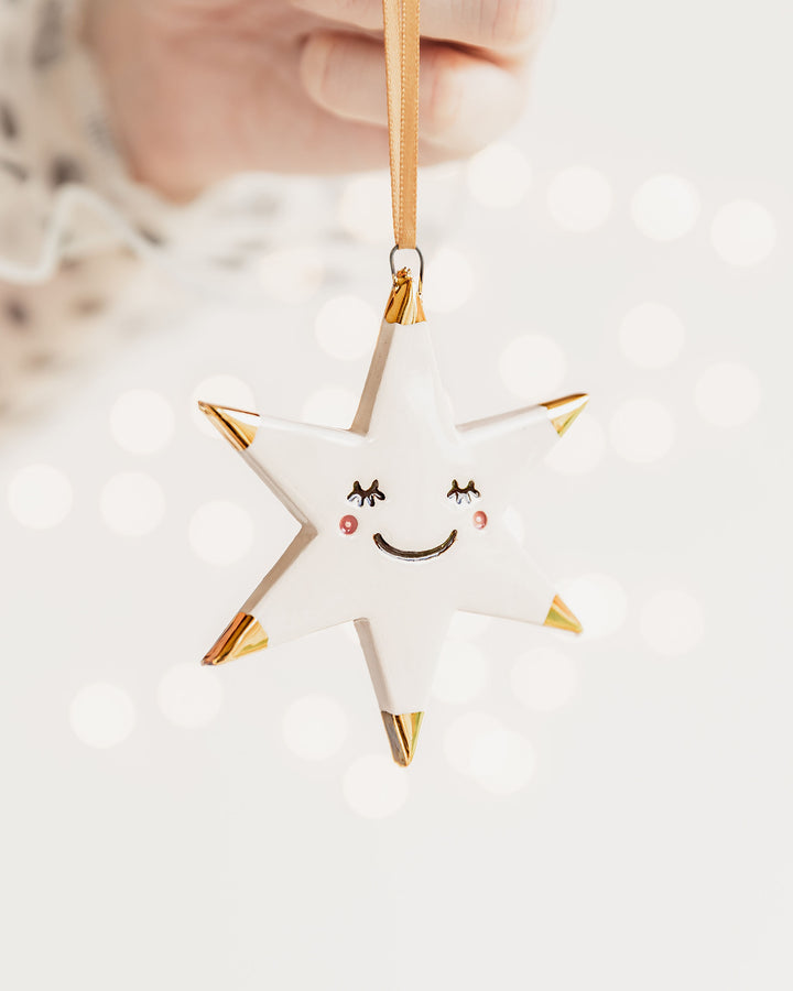White Star Christmas Ornament with Eyelash Smiley Face and Gold Tips
