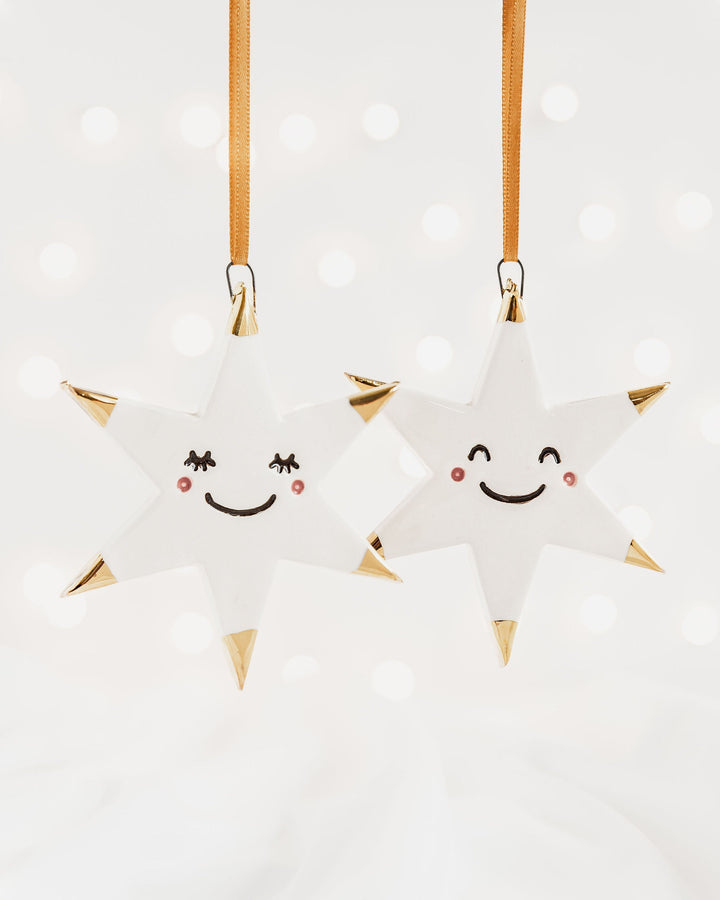 Set of 2 White Star Christmas Ornaments  with Smiley Faces and Gold Tips