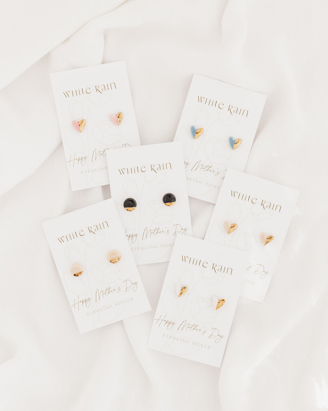 Ceramic stud earrings with gold lustre on a Happy Mother's Day Earring card