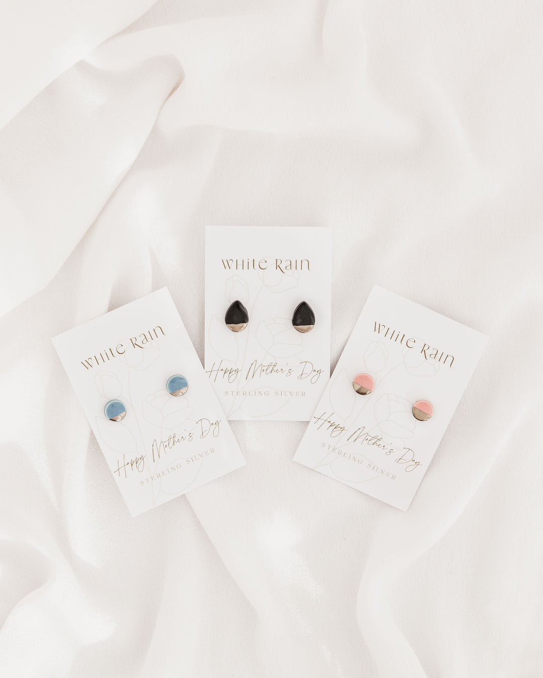 Ceramic stud earrings with platinum lustre on a Happy Mother's Day earring card