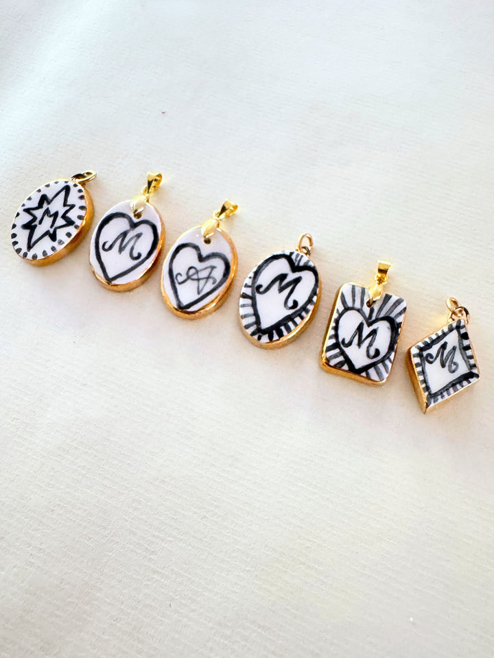 Personalised Initial Pendant with Star and Border - Oval