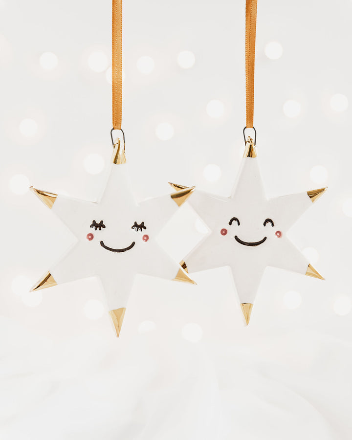 White Star Christmas Ornament with Smiley Face and Gold Tips