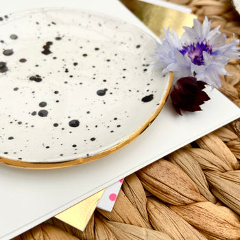 Spotty trinket dish and stud earrings on a Merry Christmas Card