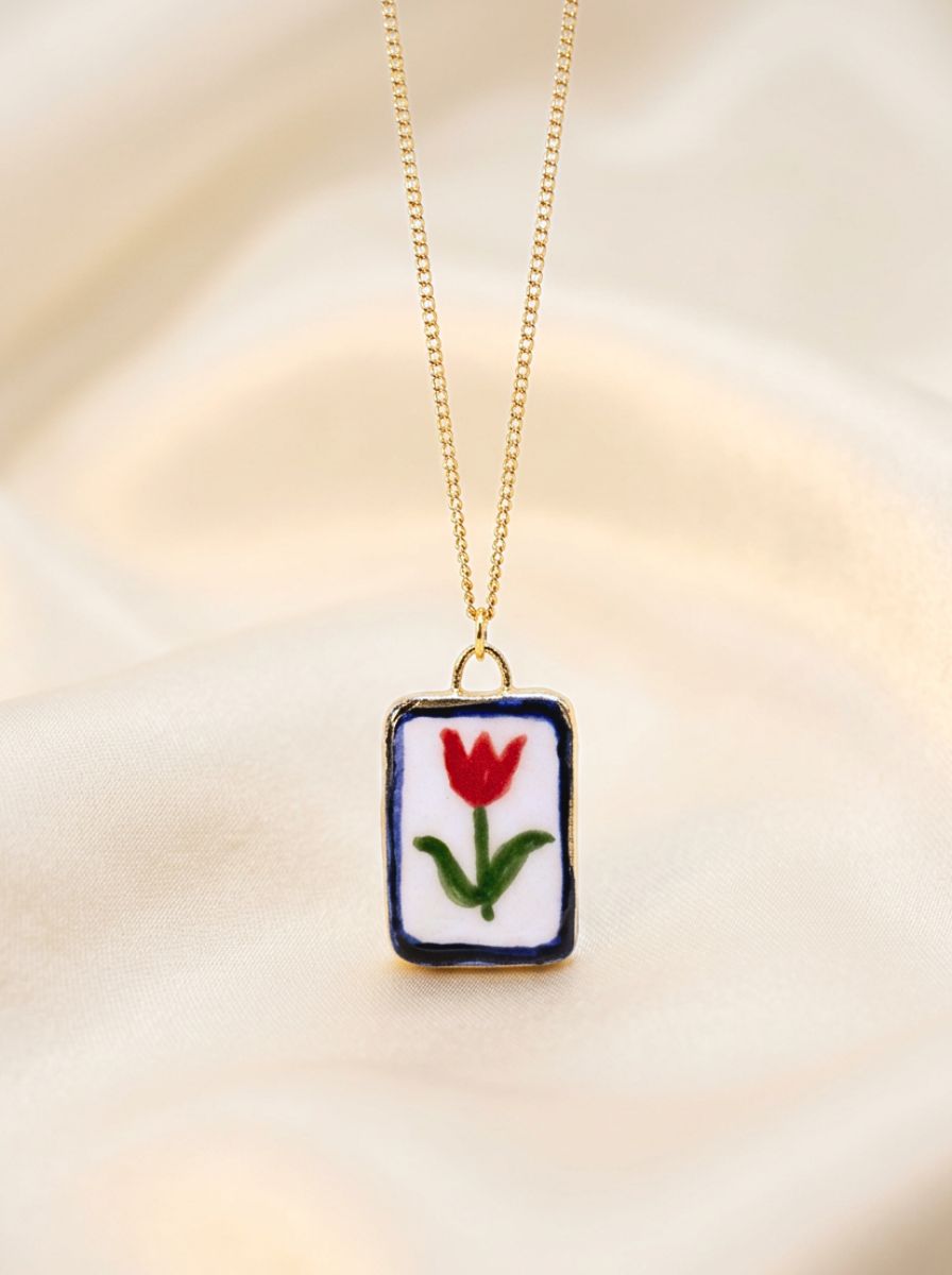 Red flower with blue border Pendant