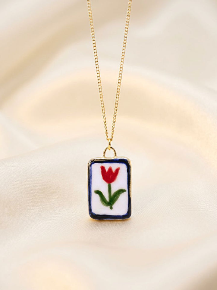 Red flower with blue border Pendant