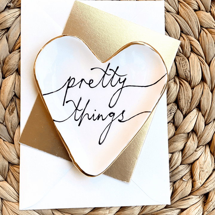 Pretty Things trinket dish and stud earrings on a Merry Christmas Card