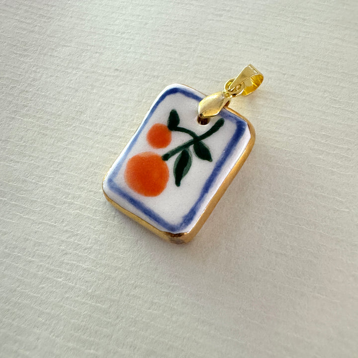 Oranges with blue border Pendant