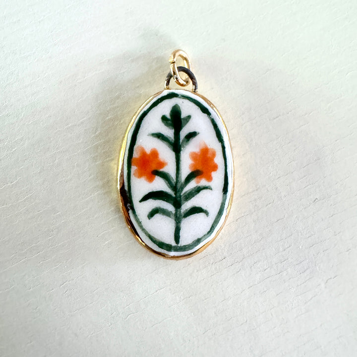 Orange Flowers with green border Pendant