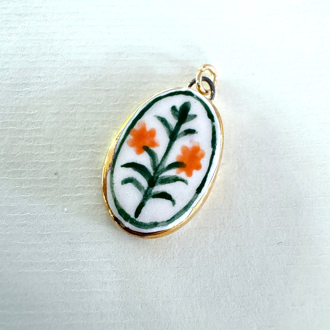 Orange Flowers with green border Pendant