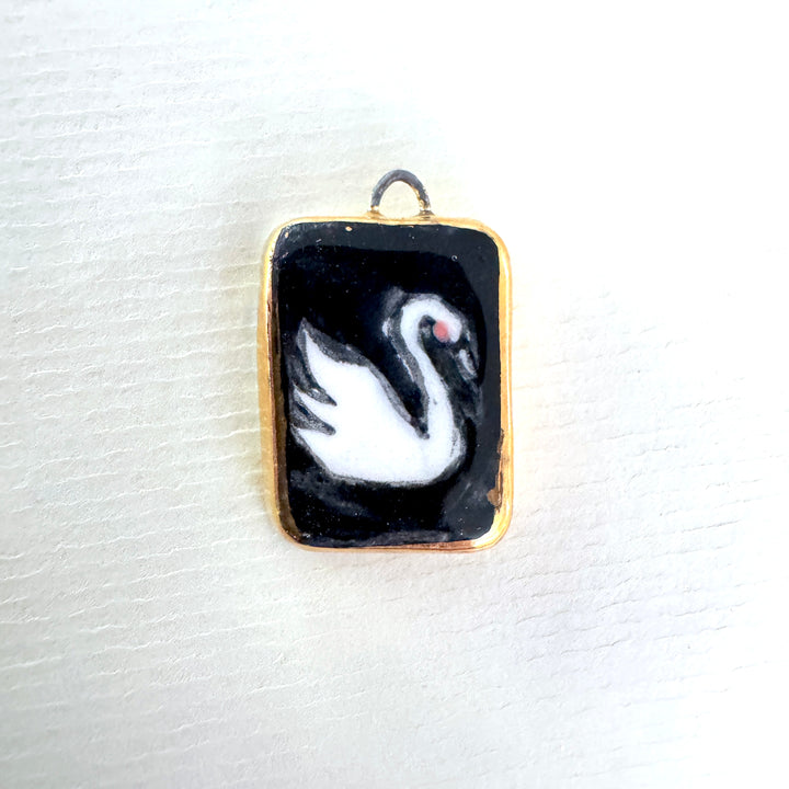 Swan with black background Pendant