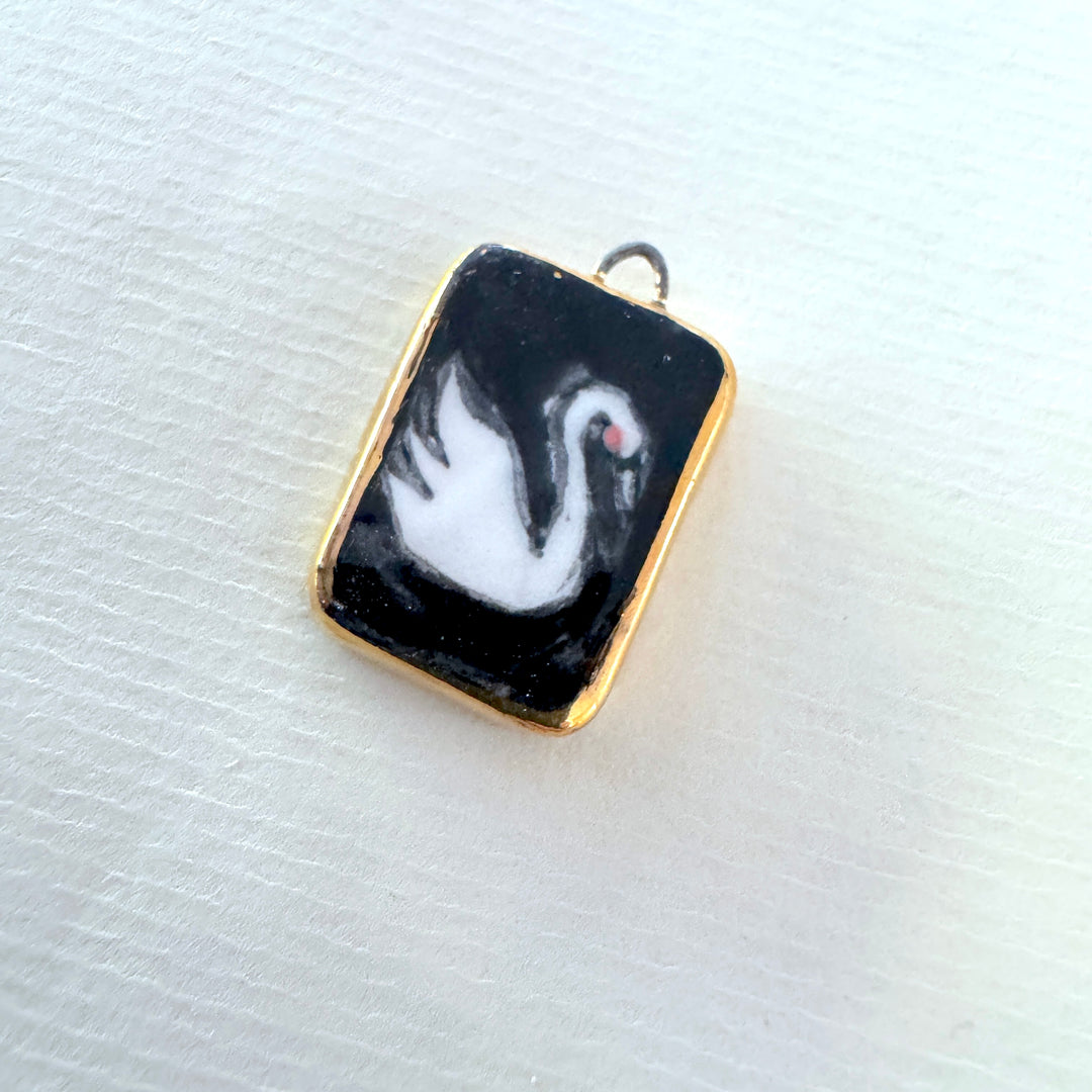 Swan with black background Pendant