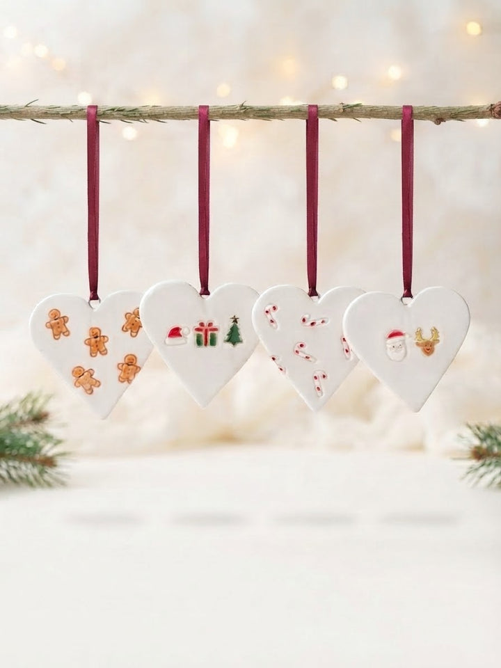 Set of 4 Heart ornaments with Christmas Motifs