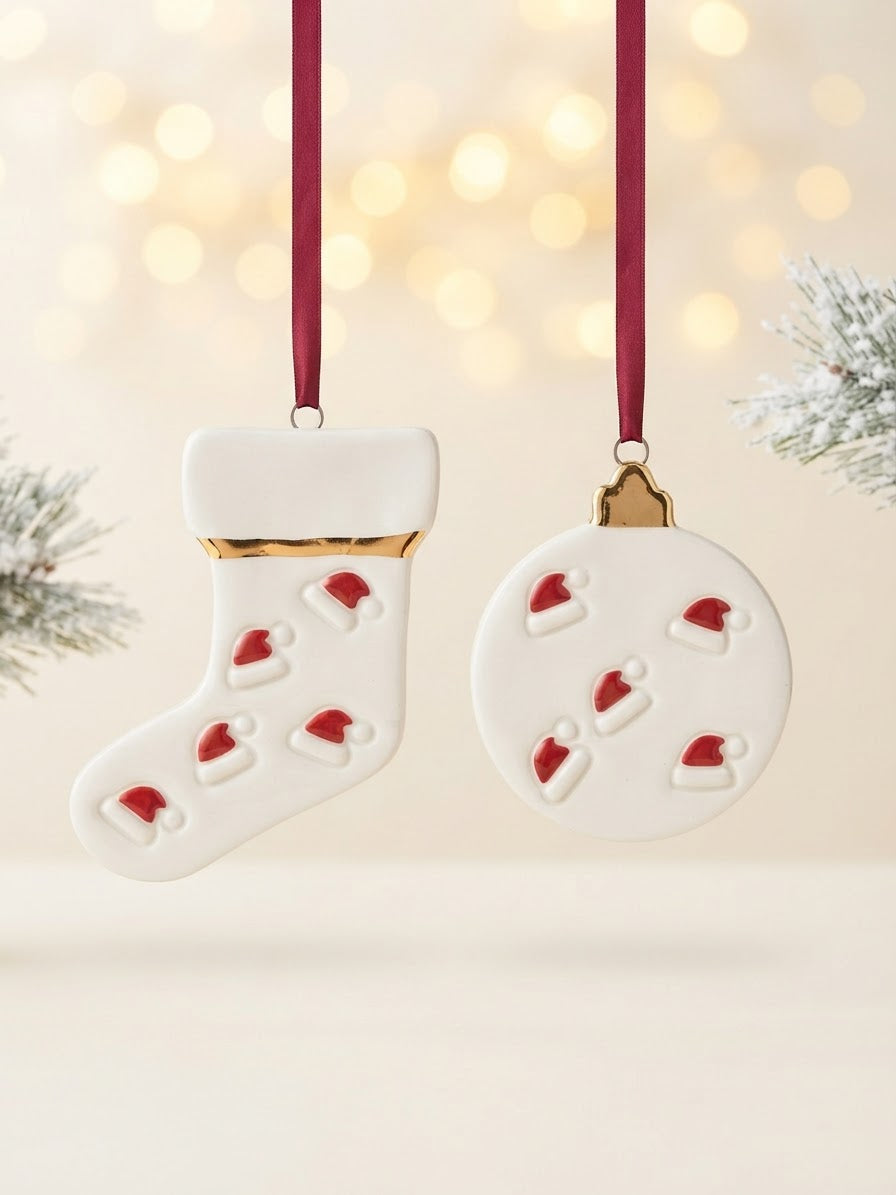 Set of 2 Ornaments with Santa hat pattern