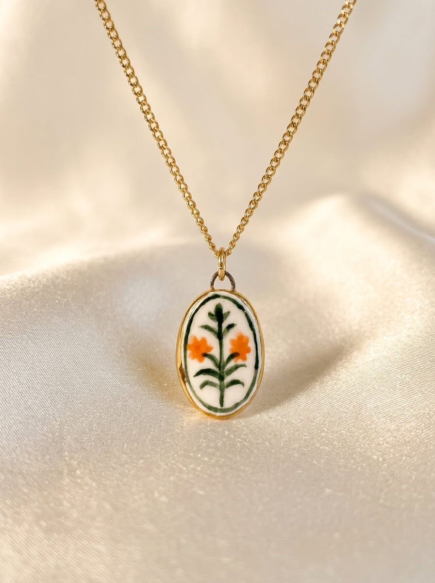Orange Flowers with green border Pendant