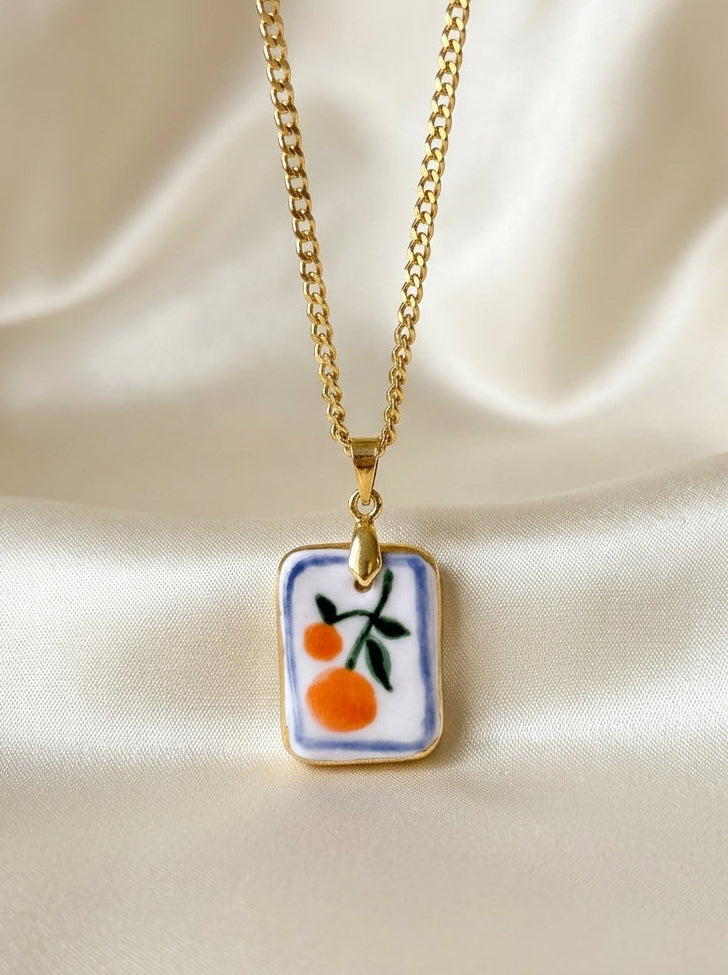 Oranges with blue border Pendant