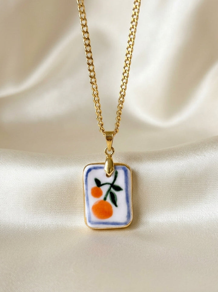Oranges with blue border Pendant