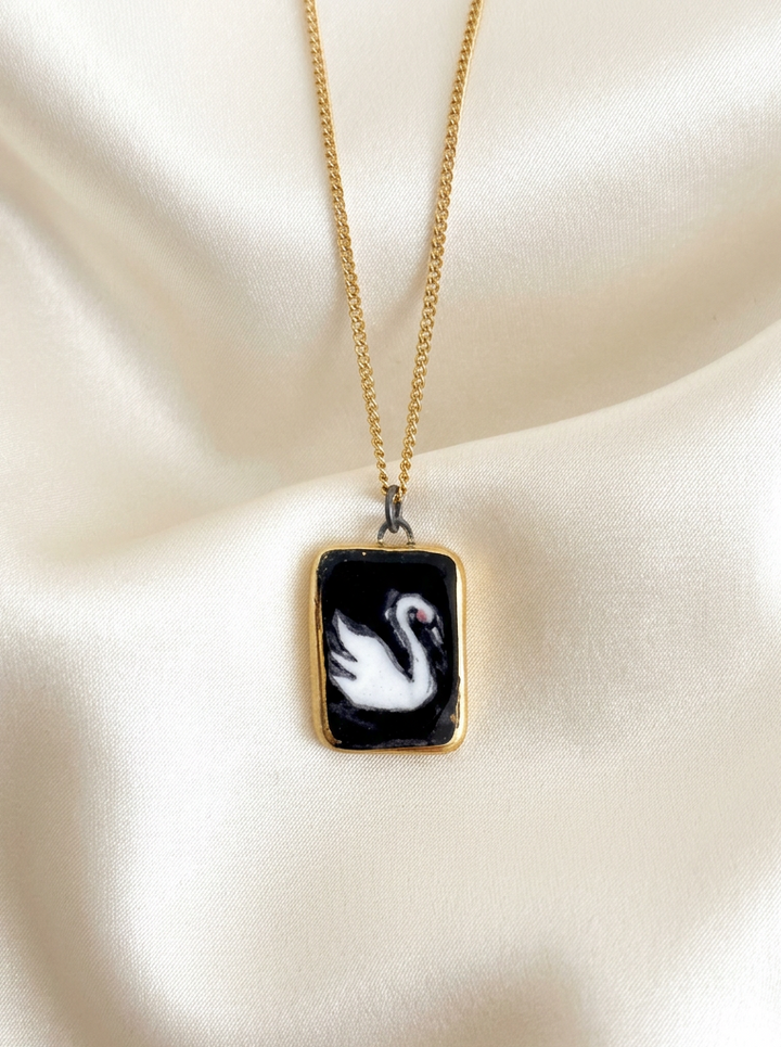 Swan with black background Pendant