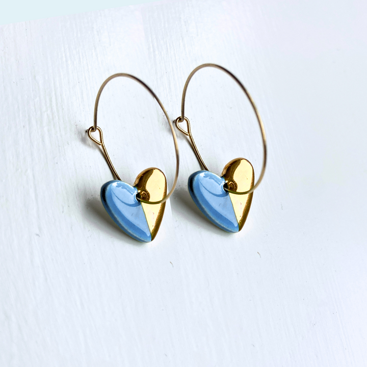 Hoop Earrings with Light Blue Heart Charms