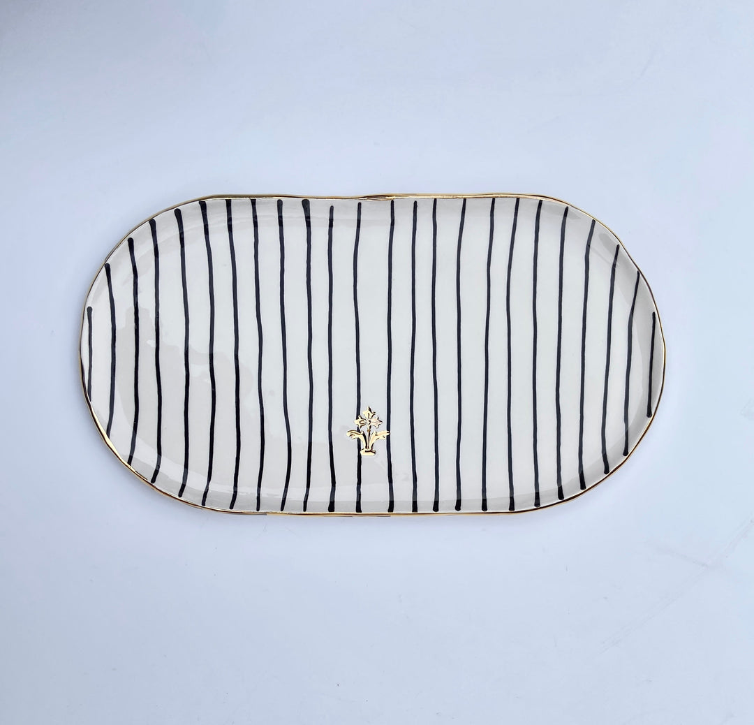 Oval Platter with Black Stripes and Gold Flower Motif Stamp